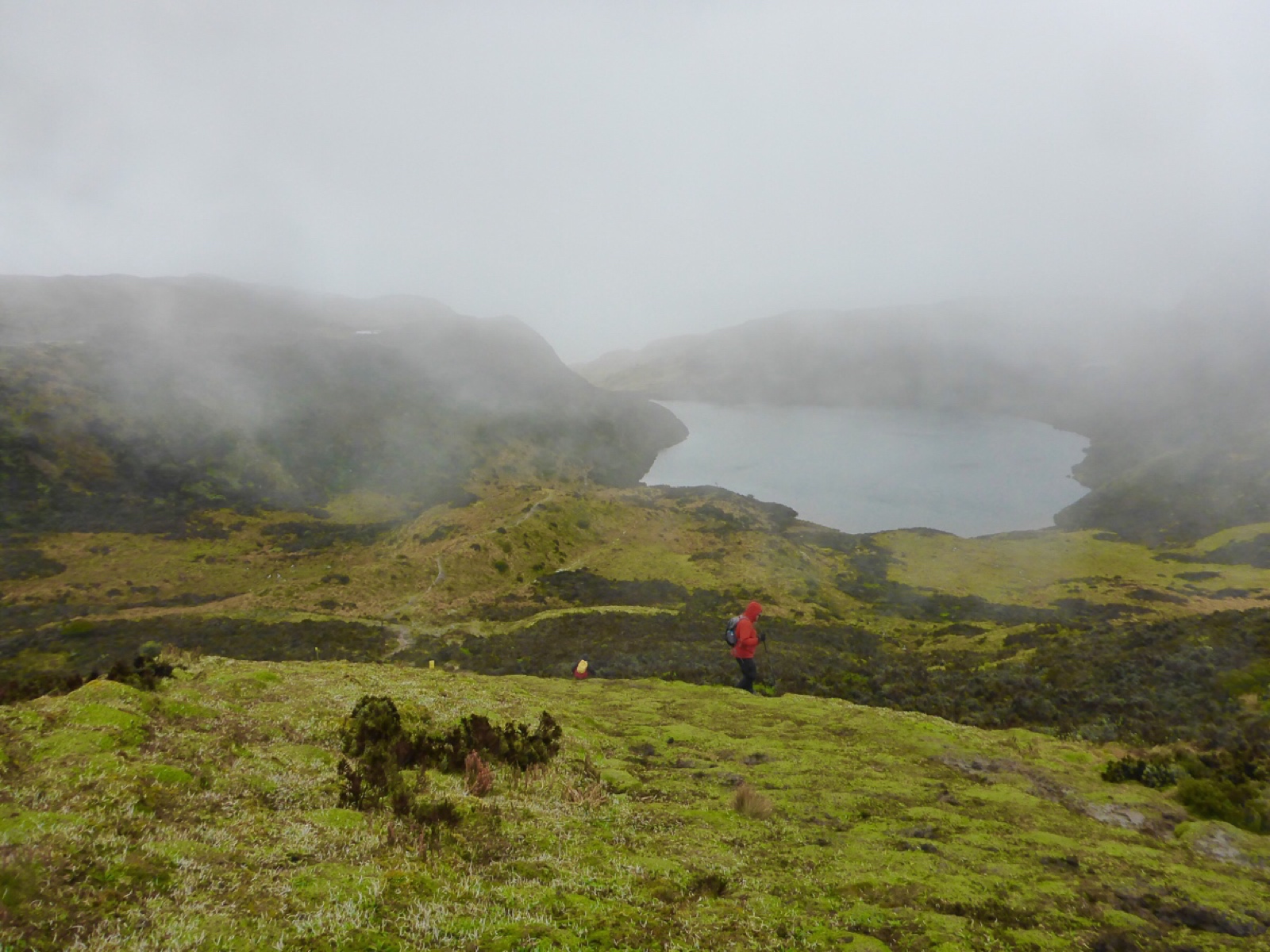 We caught a brief glimpse of this lake before the clouds swallowed it up again.