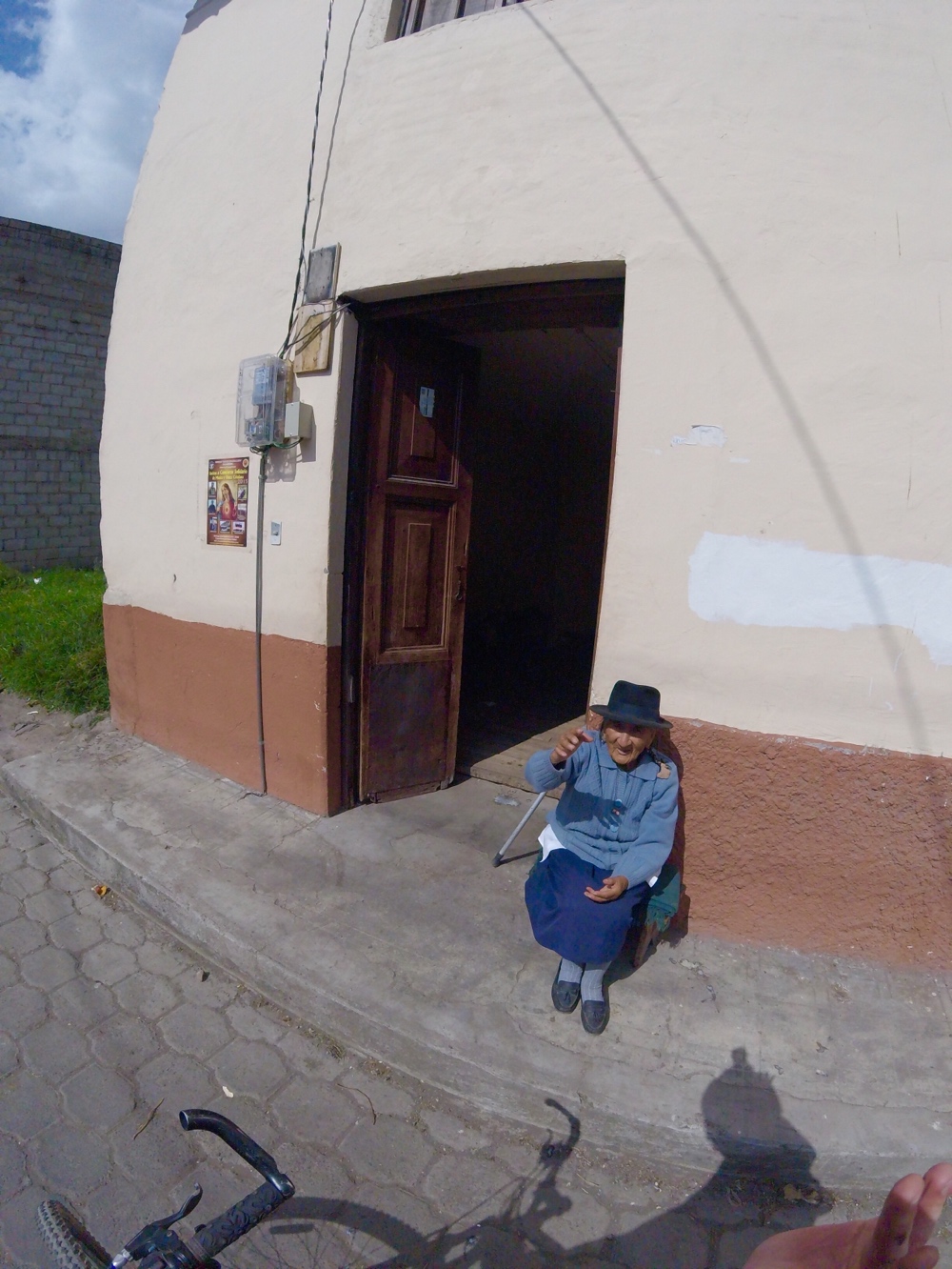 A friendly Otavalan women waving hello in Ecuador