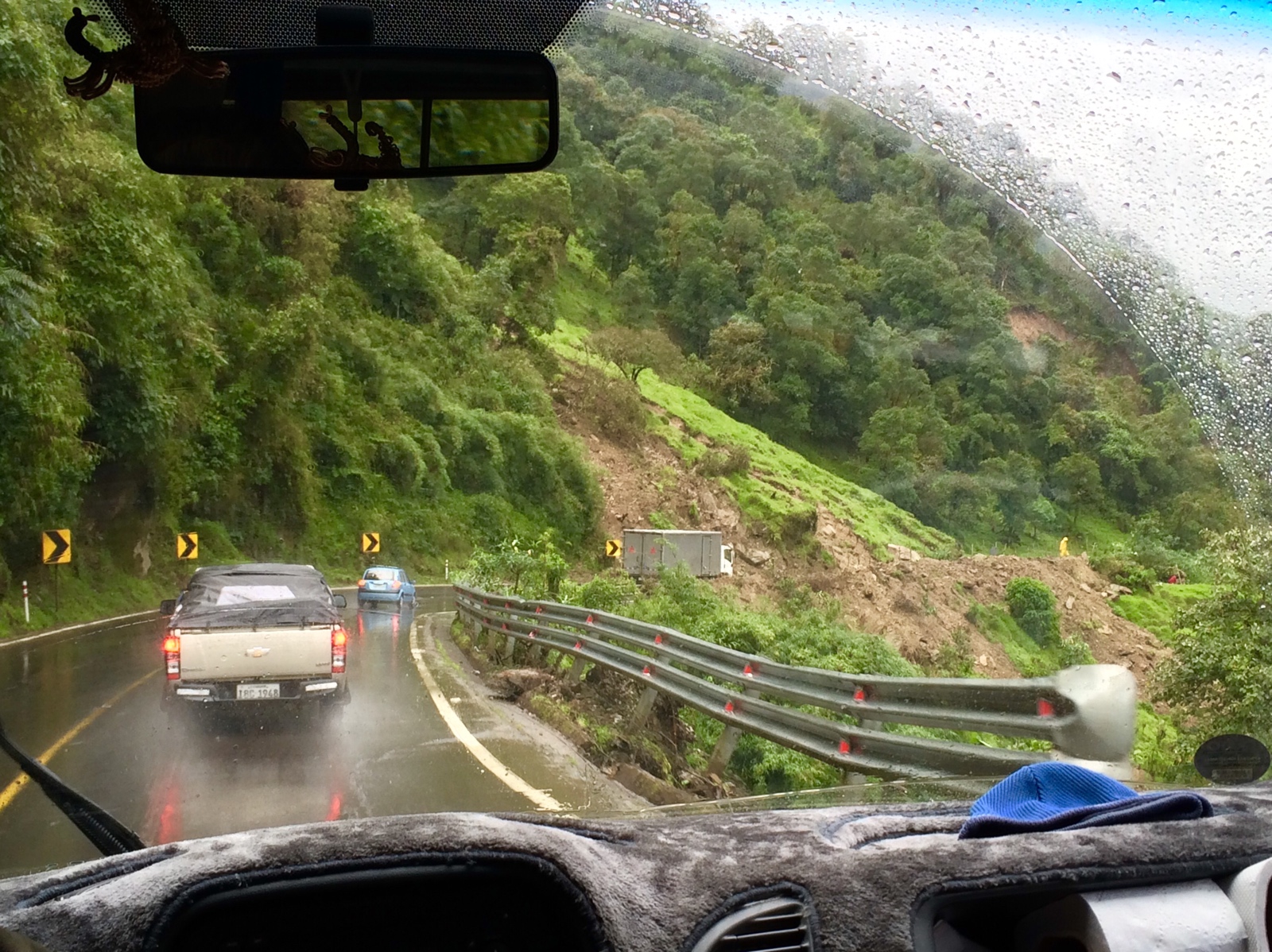 Driving through one of countless recent landslides.