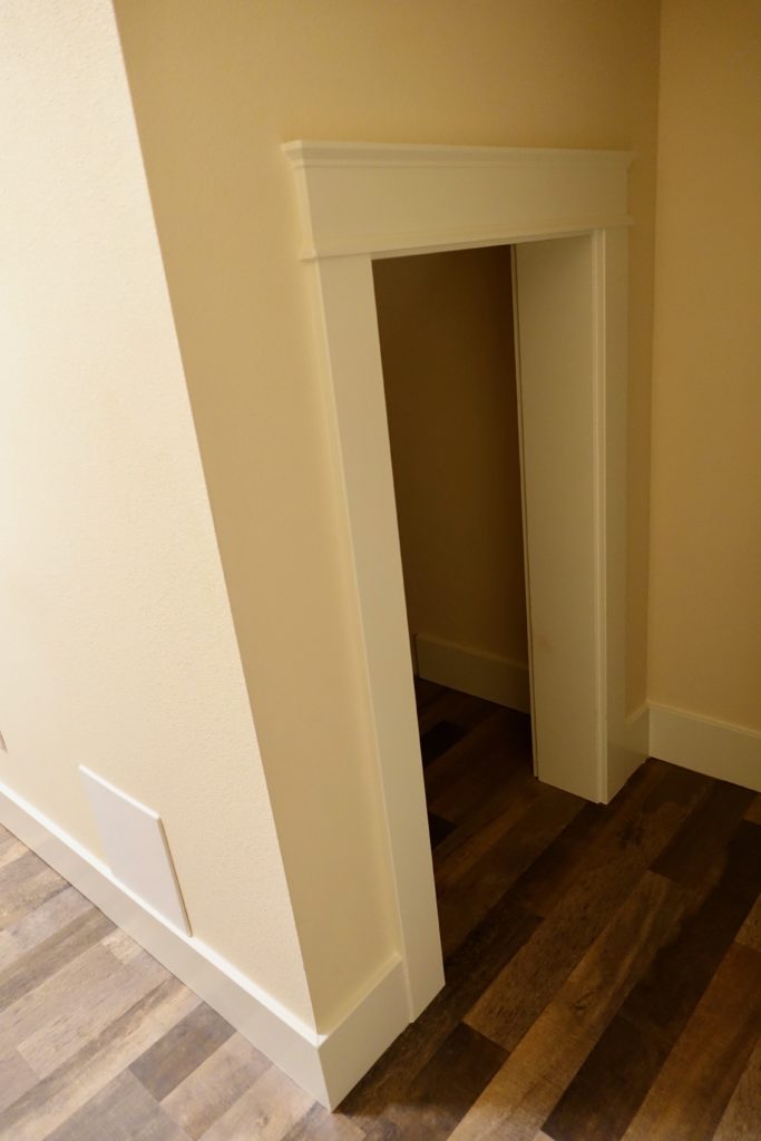 A little "Harry Potter Room" built under the stairs for additional storage.