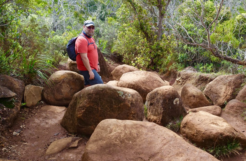 Glenn working his way through a boulder field on the Canyon Trail in Waimea Canyon.