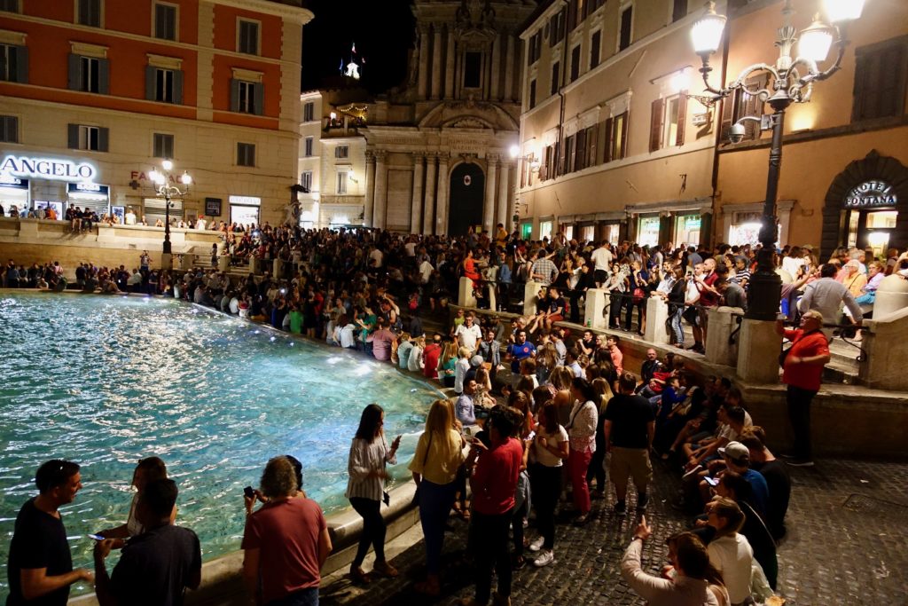 the large crowds at the Trevi Fountain