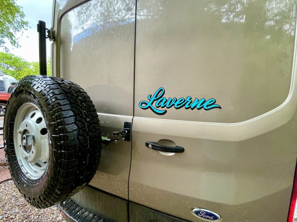 Sticker of "Laverne" on the rear door of the campervan