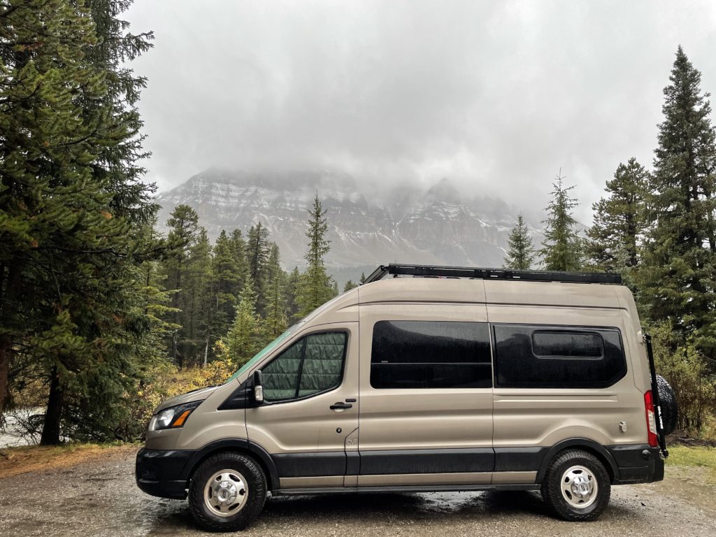 One of our campsites in the Canadian Rockies with a cloudy view covering the mountains.