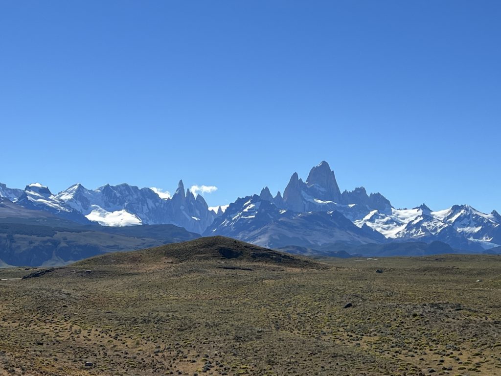 The iconic mountains of the Argentine Patagonia region on an uncharacteristically cloudless day.