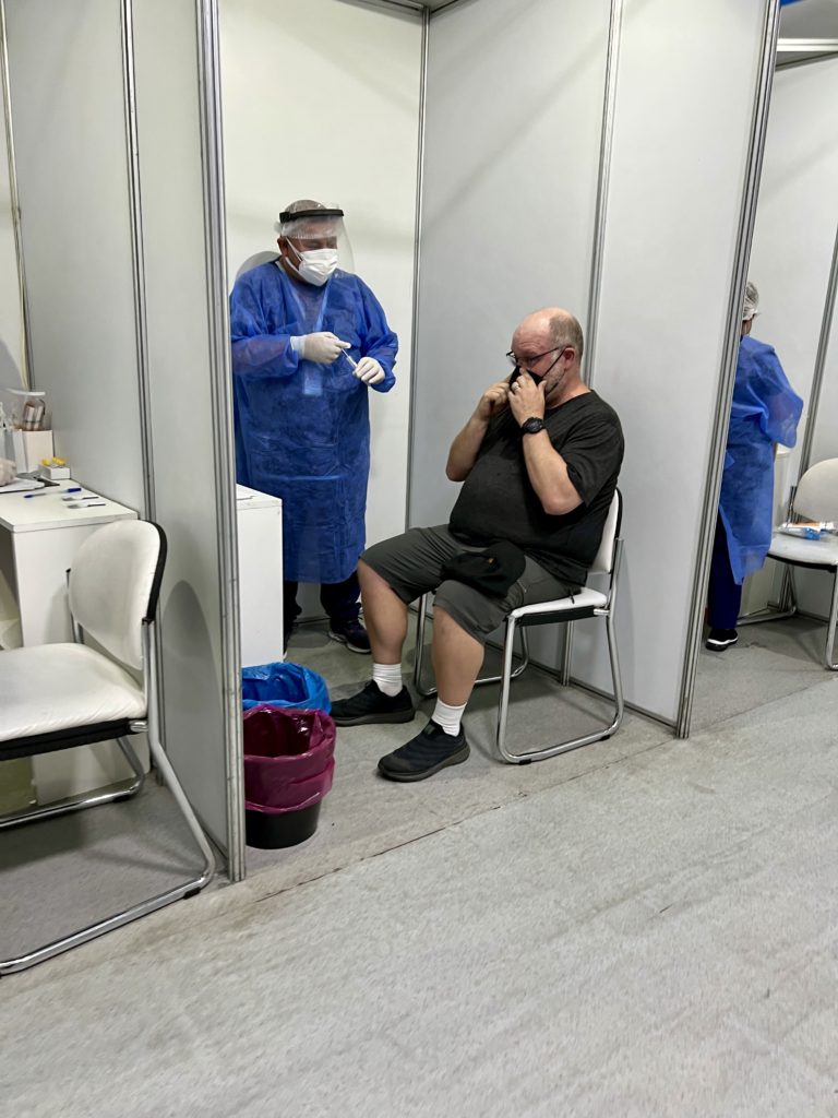 Glenn getting his COVID test to fly back to the U.S. 